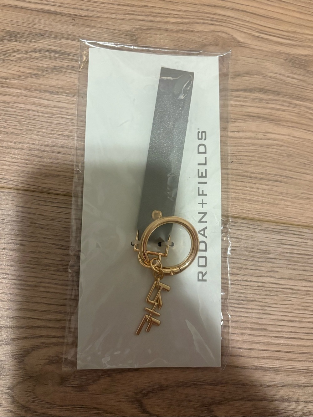 Rodan + Fields Gold Keyring Charm with Logo Dangles